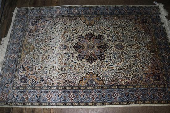 Cream ground rug